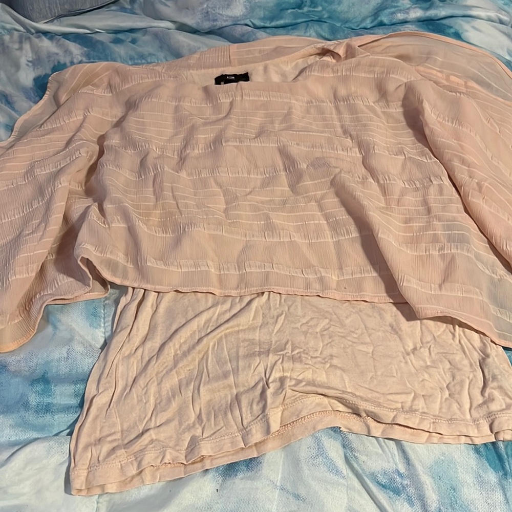 Pink shirt with flowy top connected
